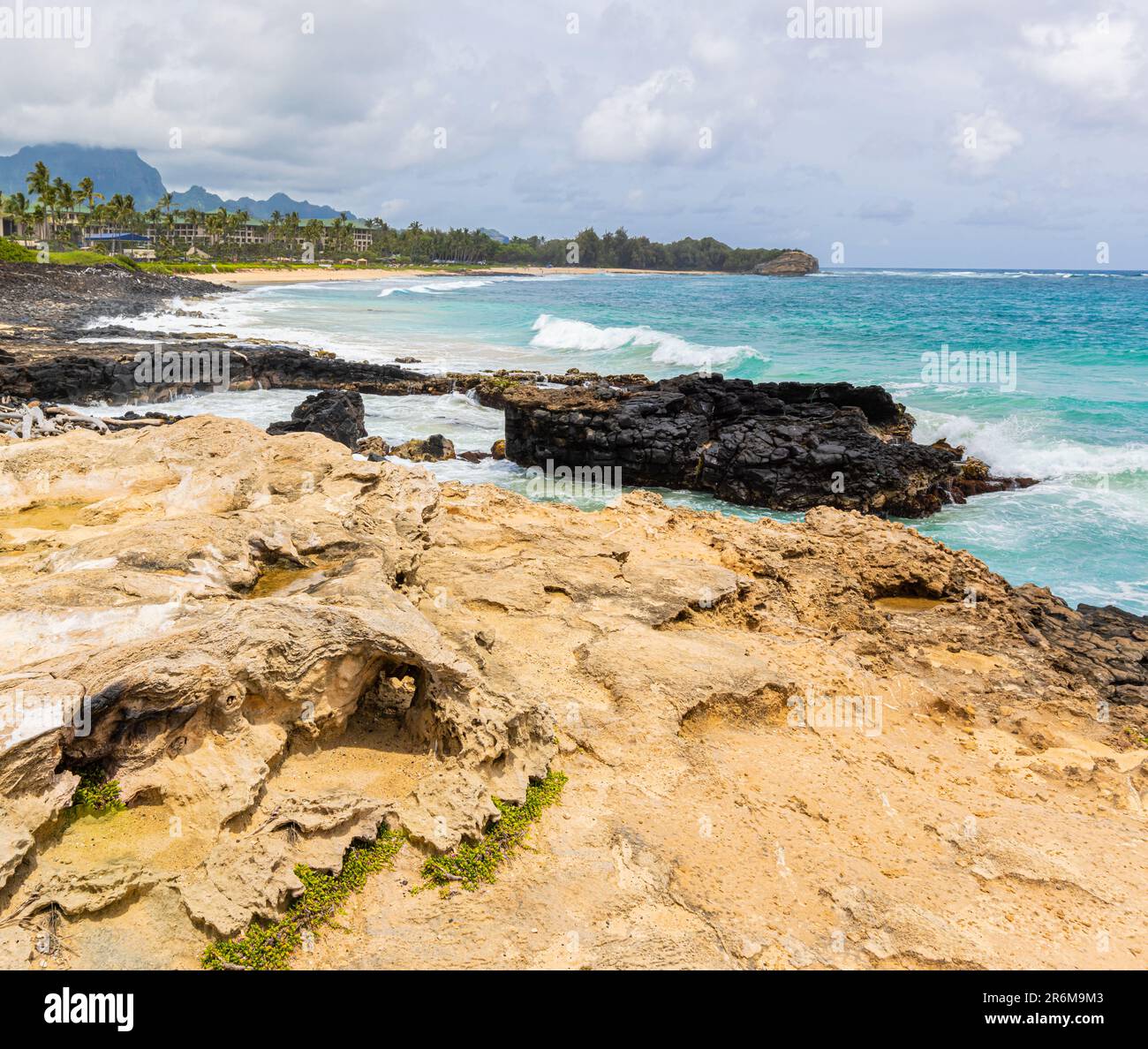 Volcanic Shoreline of Shipwreck Beach with Ha'upu Ridge In The Distance