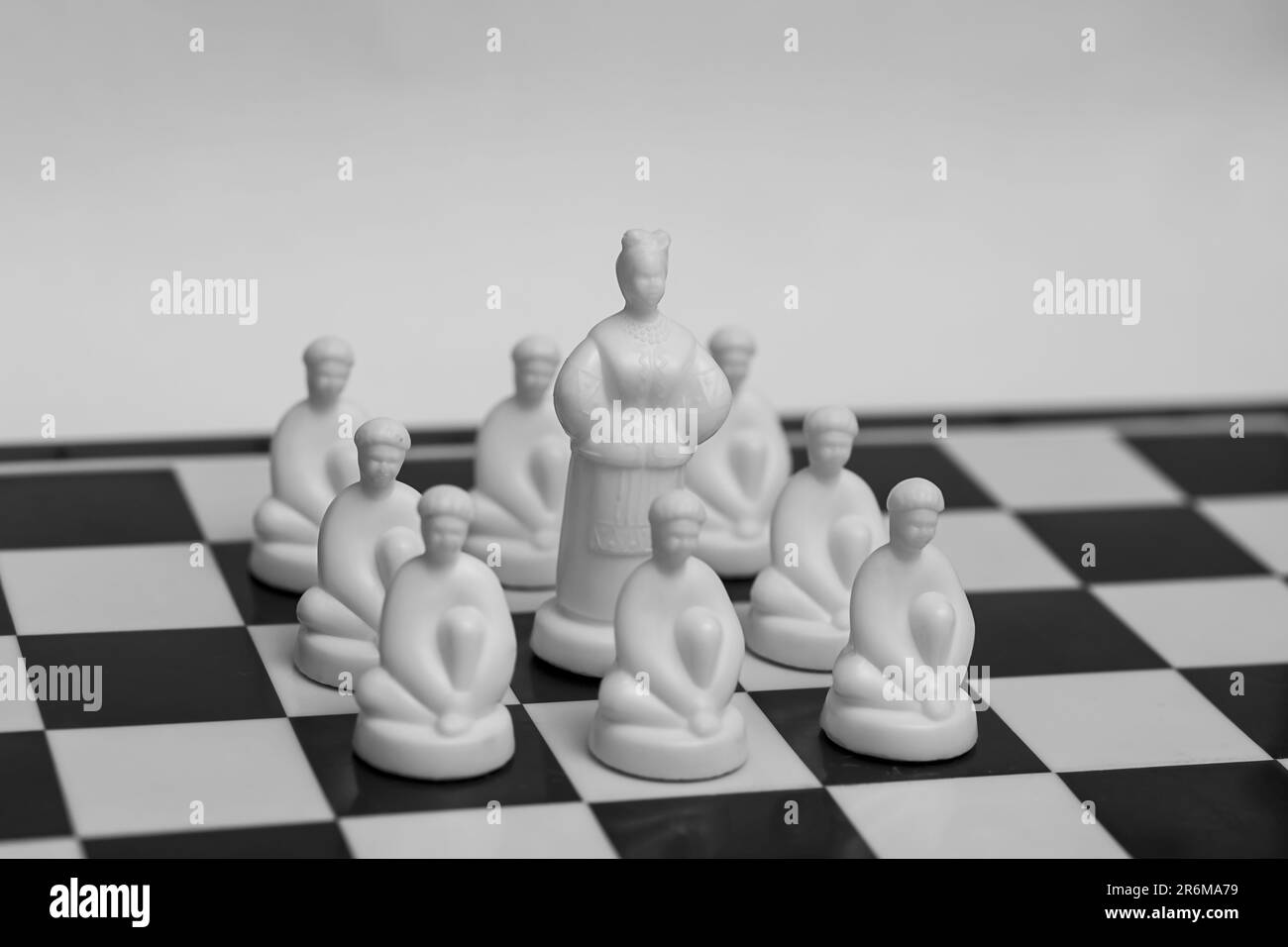 Ukrainian chess with Gogol's heroes on the board symbolizes battle and war Stock Photo
