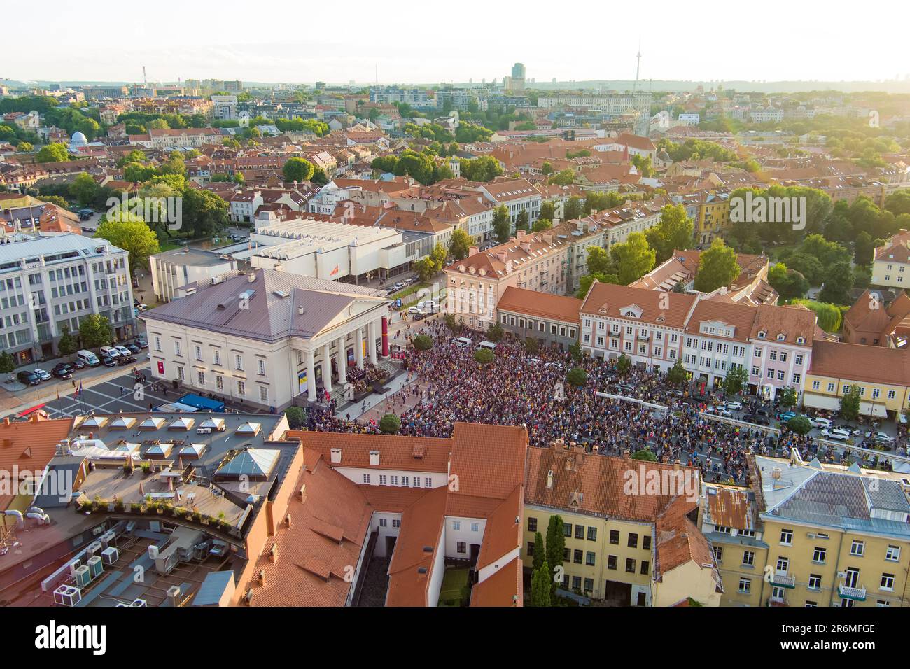 Aerial view of crowds celebrating Lithuanian Statehood Day. Lots of people singing national anthem of Lithuania on Town Hall square. Stock Photo