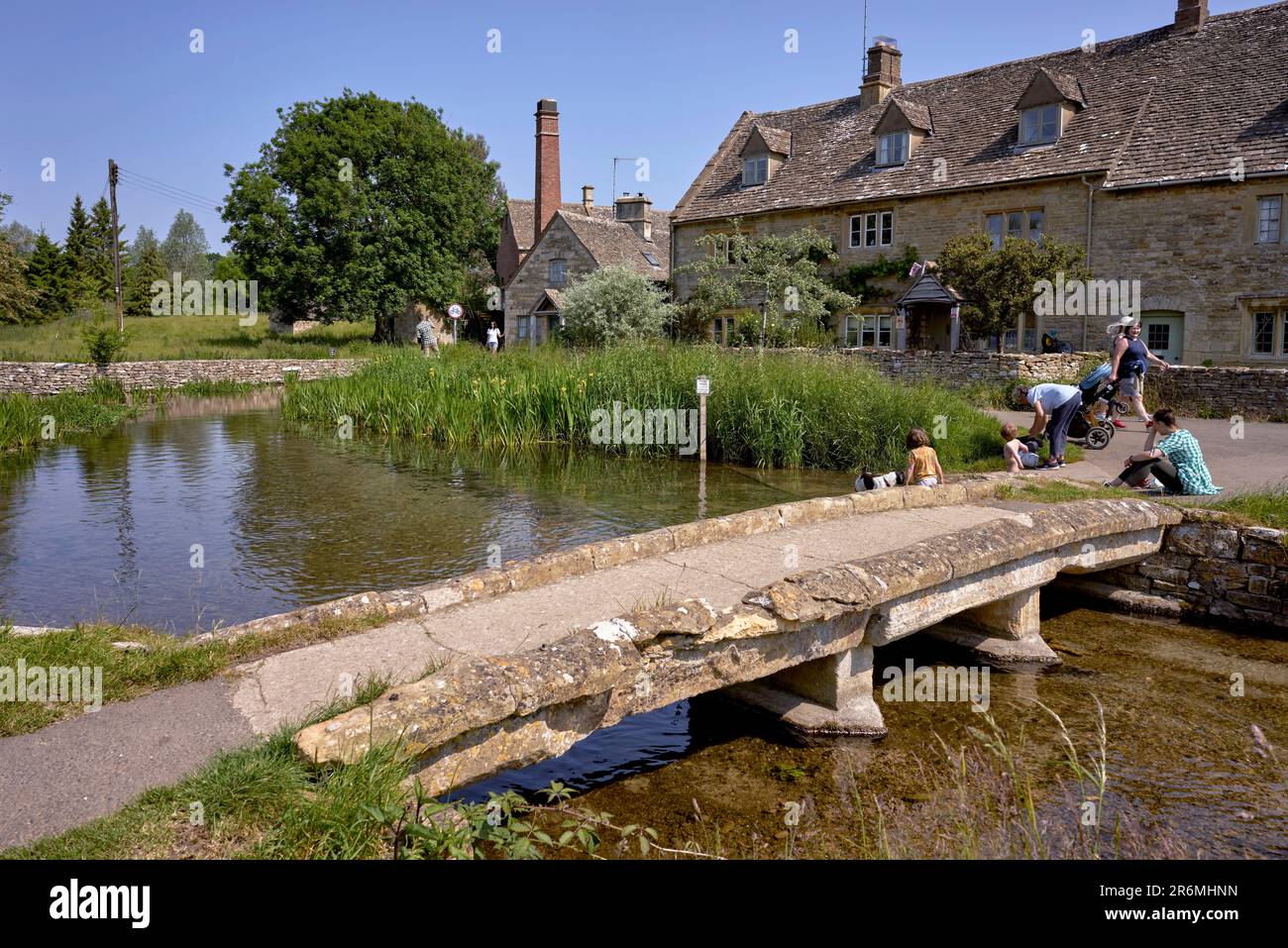 Lower Slaughter village Cotswolds. River Eye winding through the