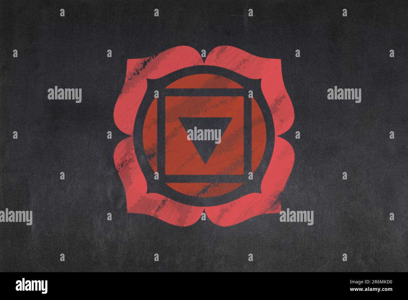 Blackboard with the symbol of the Root Chakra used in Hinduism, Buddhism and Jainism drawn in the middle. Stock Photo