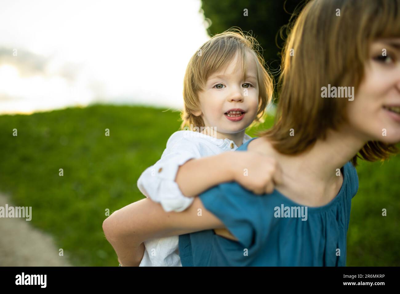 Small Sibling Cute big sister cuddling with her toddler brother. Adorable preteen ...