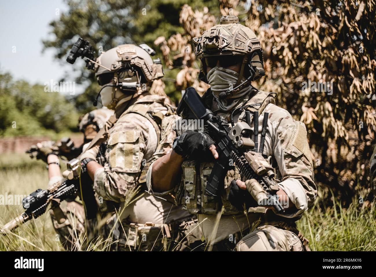 Soldiers running forward and attacking enemy during military operation ...