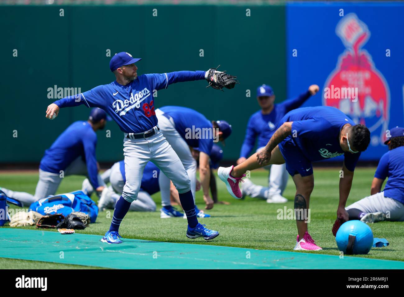Los Angeles Dodgers bullpen catcher Steve Cilladi and teammates