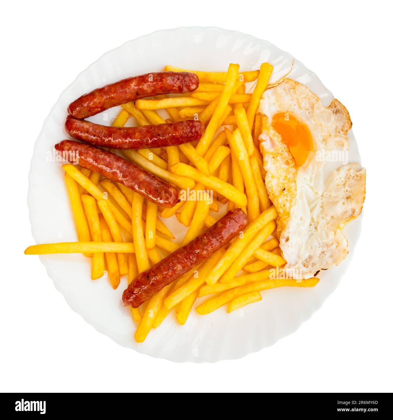 Delicious dish of French fries with fried eggs and sausages Stock Photo