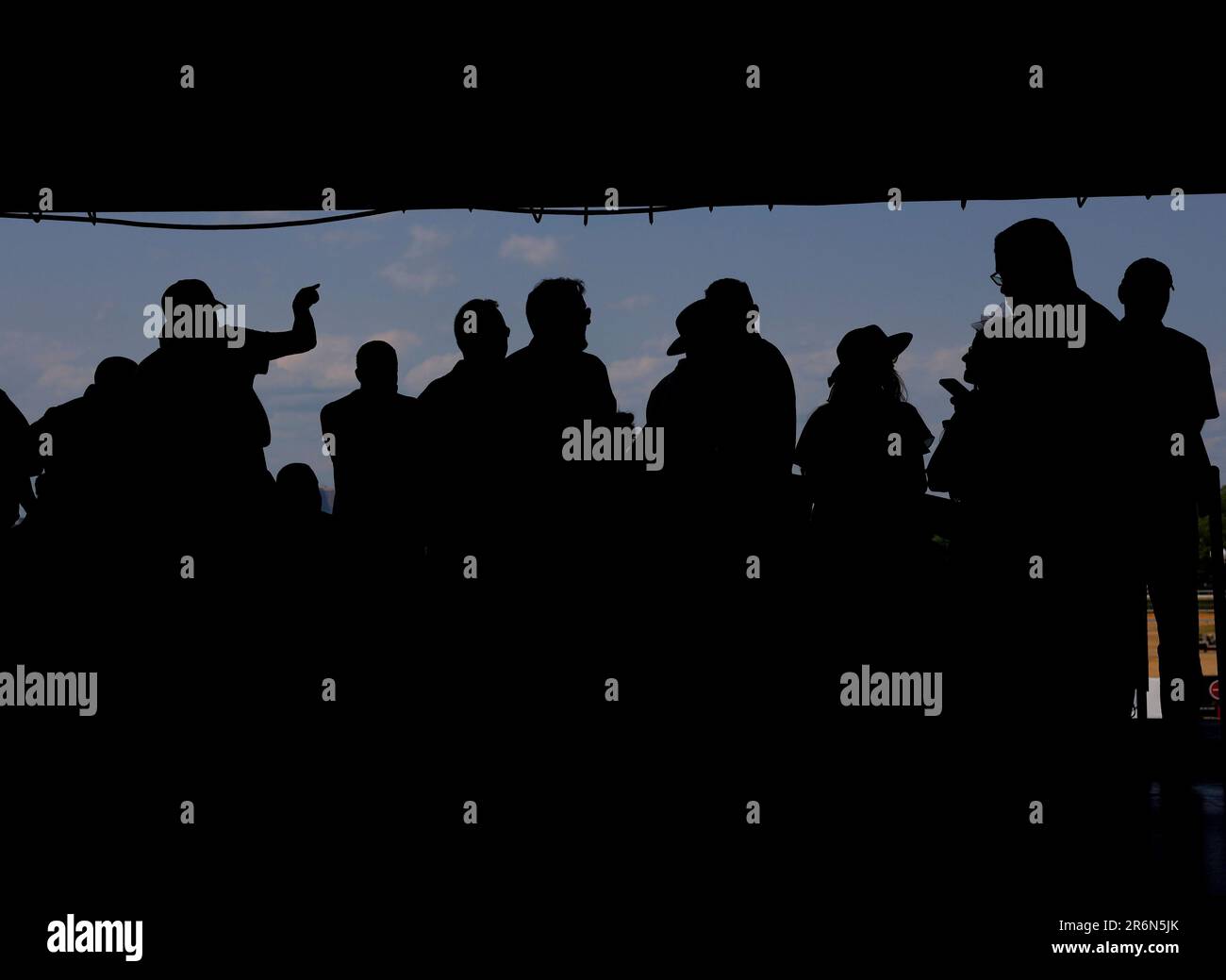 Elmont, United States. 10th June, 2023. Racing fans wear decorative hats at the 155th running of