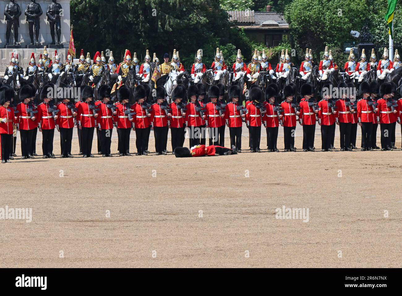 Horse Guards Parade, London, UK on June 10 2023. Army Medics attend as a soldier collapses in the extreme heat as HRH Prince William, The Prince of Wales reviews the regiments of the Household Divisions as the Regimental Colonel of the Welsh Guards during the Trooping the Colour at Horse Guards Parade, London, UK on June 10 2023. The Divisions on Parade include, the Foot guards; The Grenadier Guards, The Coldstream Guards, The Scots Guards, The Irish Guards, The Welsh Guards, with the Household Cavalry Mounted Regiment made up of The Life Guards and The Blues and Royals. Credit: Francis Knight Stock Photo