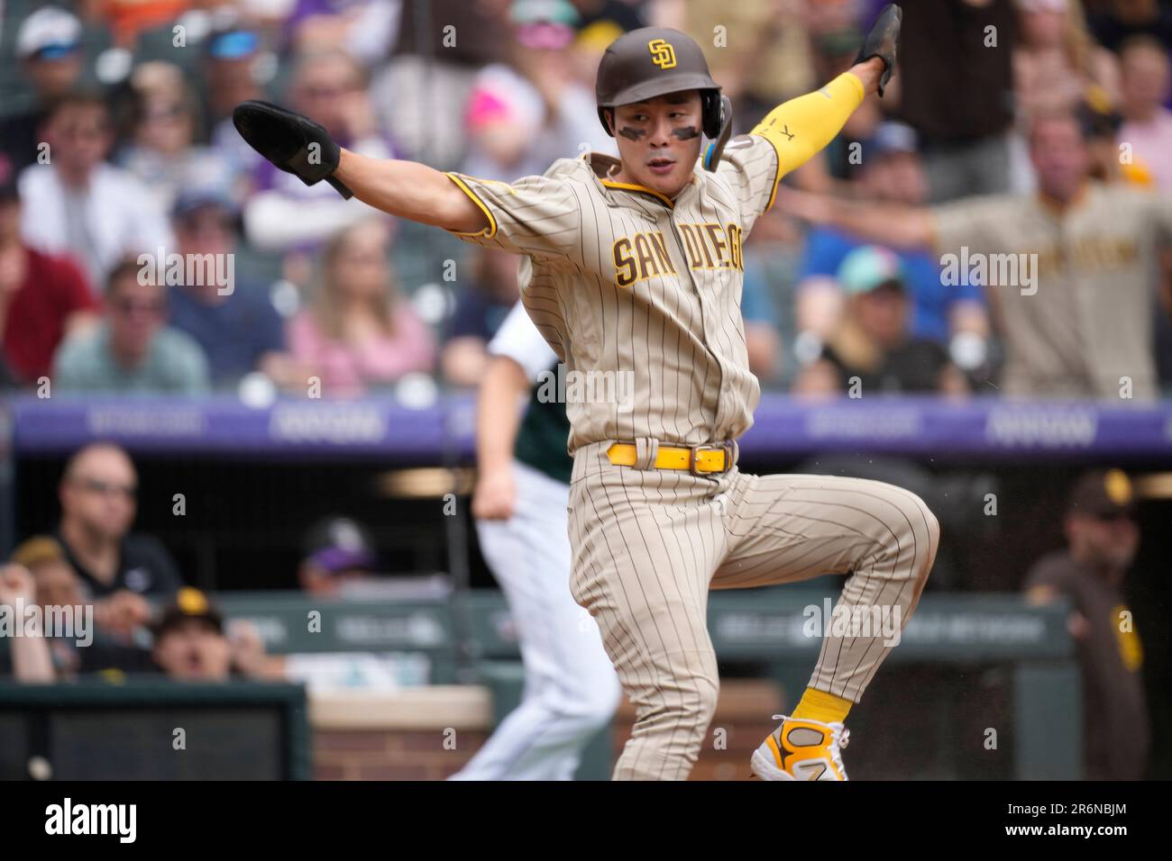 San Diego Padres' Ha-Seong Kim reacts after scoring on a single