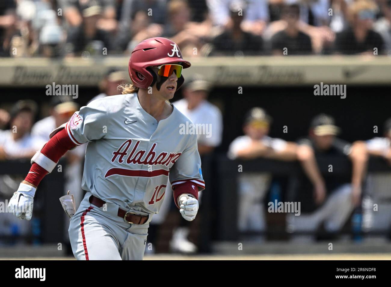 Alabama's Jim Jarvis (10) runs to first base after hitting a single off