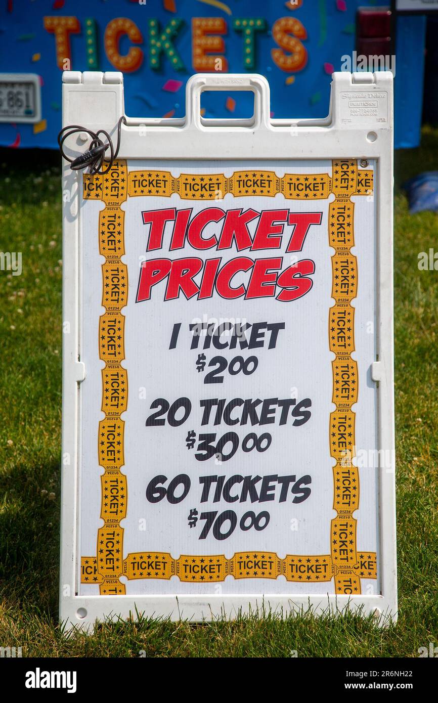 A sign showing ticket prices at a carnival Stock Photo
