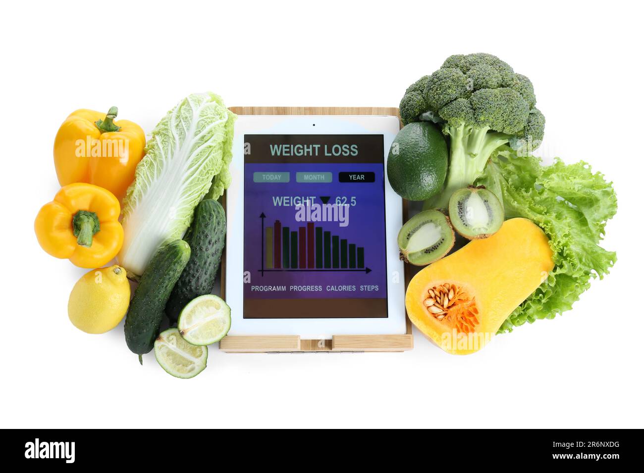 Tablet with weight loss calculator application and food products on ...