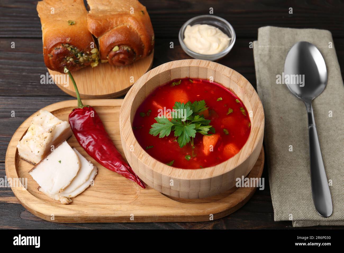 Delicious borsch served with pampushky and salo on grey textured table,  space for text. Traditional Ukrainian cuisine Stock Photo - Alamy