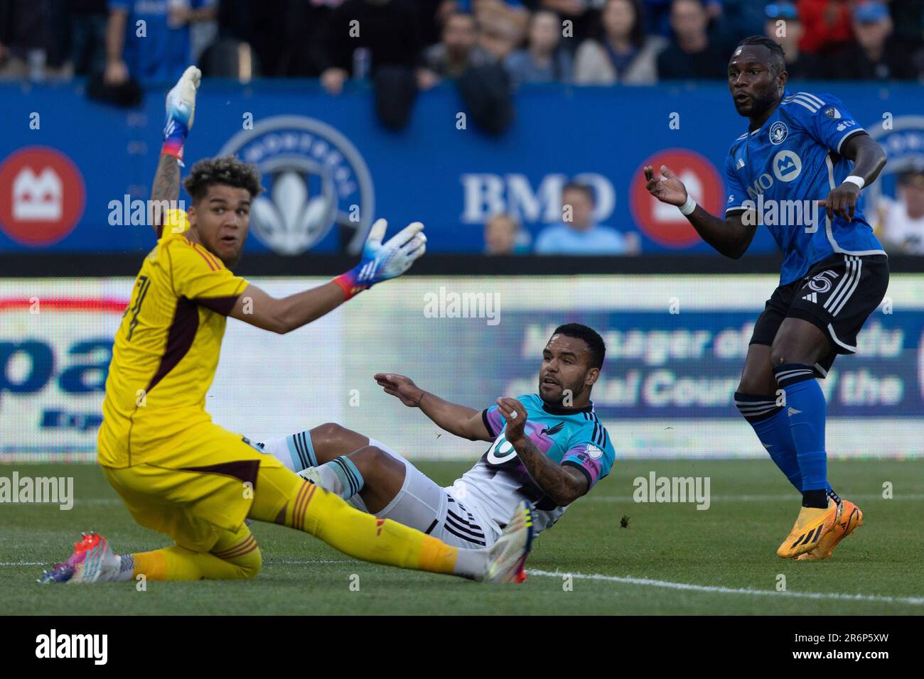 CF Montreal defender Zachary Brault-Guillard, right, watches his