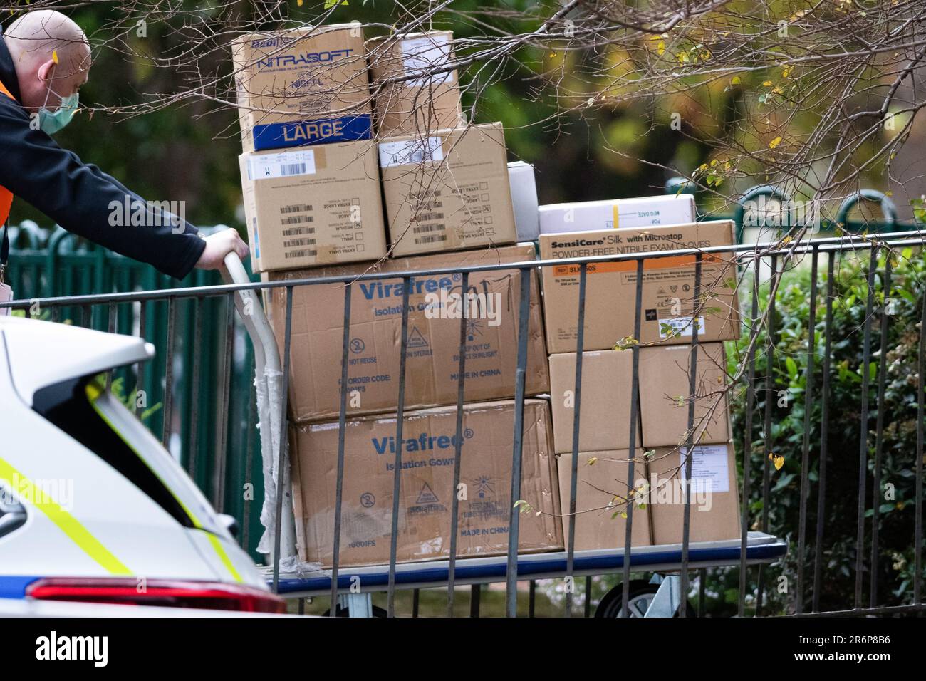 MELBOURNE, AUSTRALIA - JULY 5: Large numbers of boxes of Medical PPE are taken inside 120 Racecourse Road as government worker prepare to test 3000 affected residents amid a full and total lockdown of 9 housing commission high rise towers in North Melbourne and Flemington during COVID 19 on 5 July, 2020 in Melbourne, Australia. After 108 new cases where uncovered overnight, the Premier Daniel Andrews announced on July 4 that effective at midnight last night, two more suburbs have been added to the suburb by suburb lockdown being Flemington and North Melbourne. Further to that, nine high rise p Stock Photo