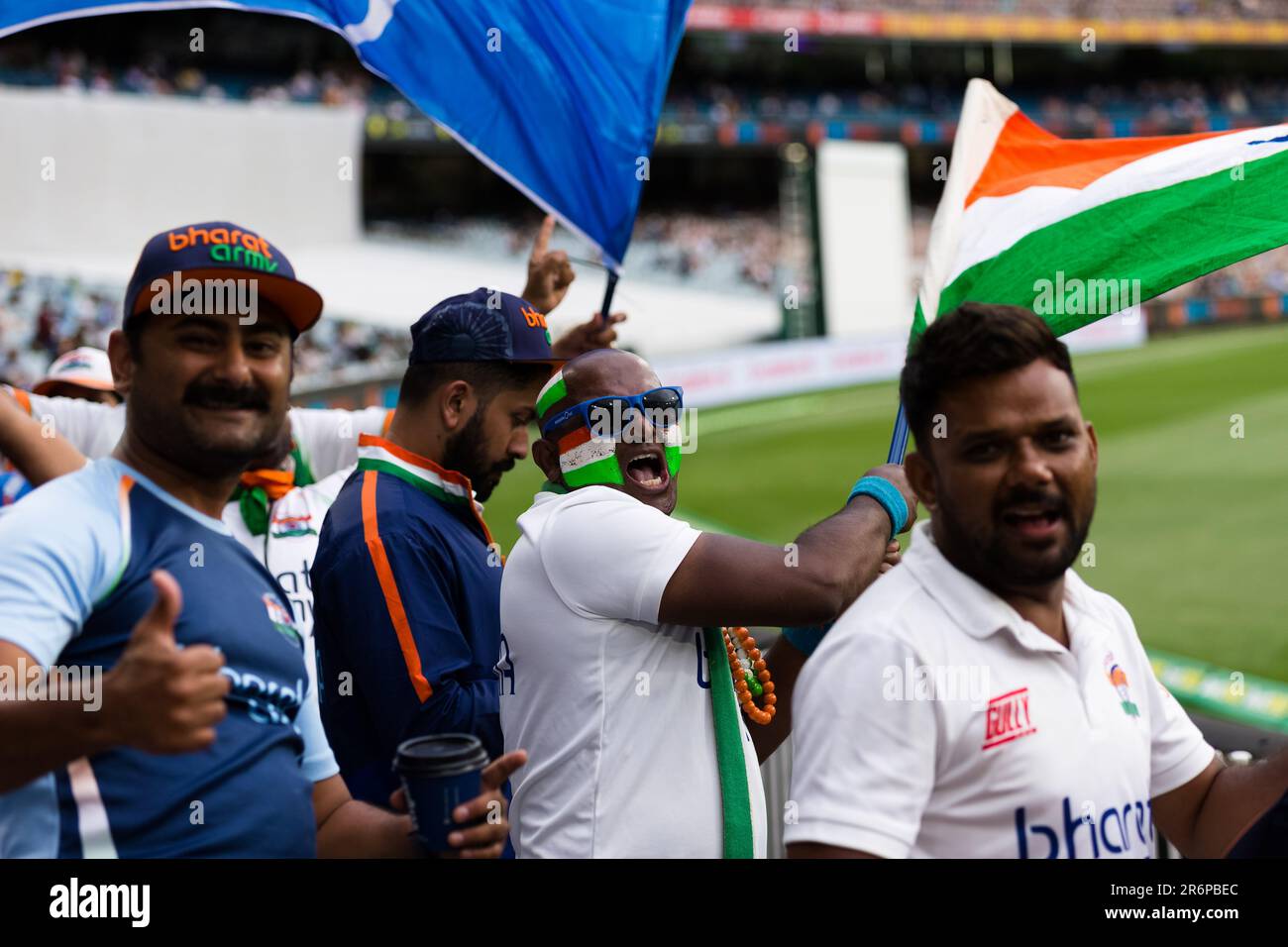 MELBOURNE, AUSTRALIA - DECEMBER 27: Indian fans with face paint can be seen cheering and waving flags during day two of the Second Vodafone Test cricket match between Australia and India at the Melbourne Cricket Ground on December 27, 2020 in Melbourne, Australia. (Photo by Dave Hewison/Speed Media/Icon Sportswire) Stock Photo