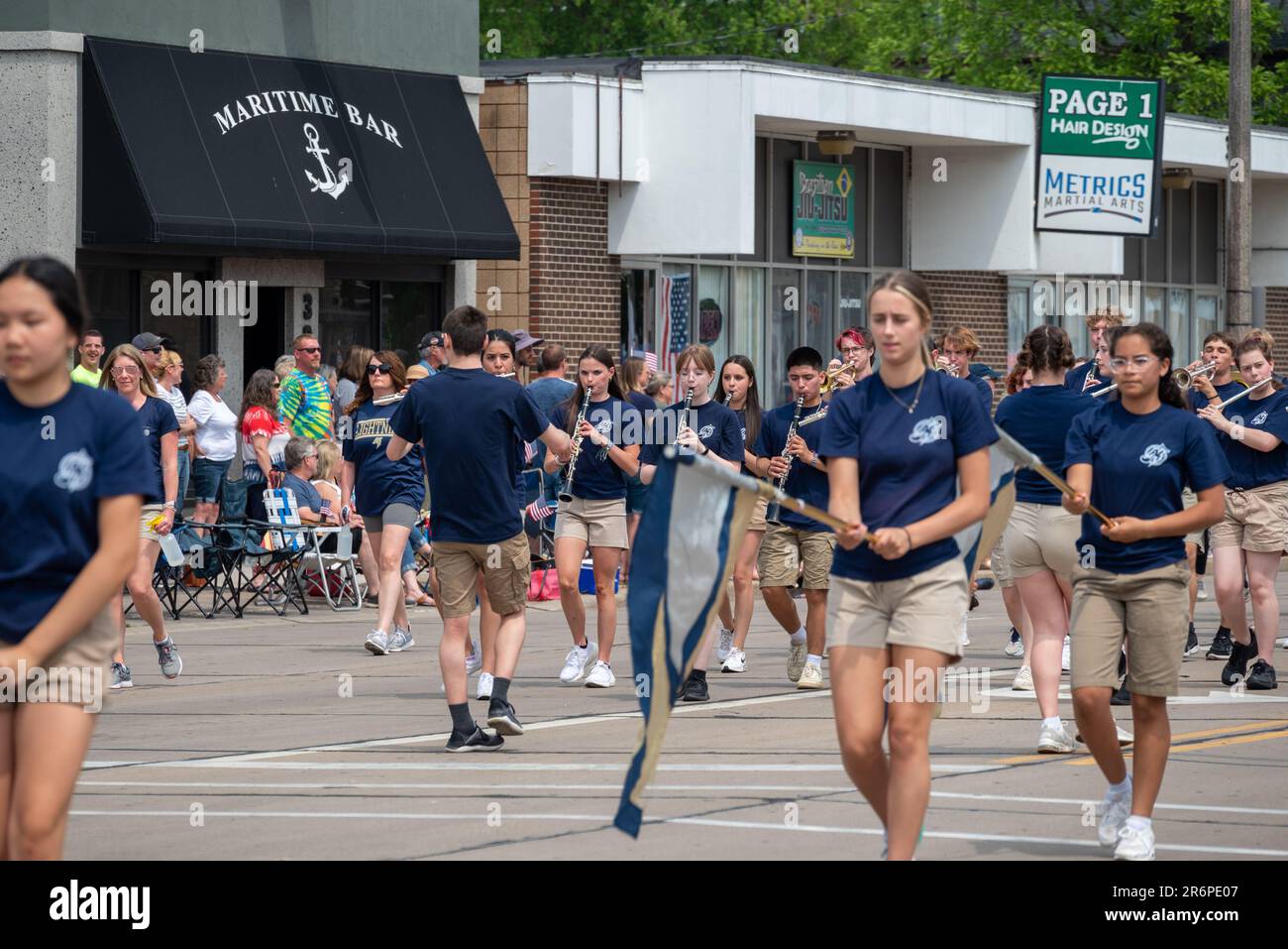 Spectators and participants of the flag day parade in Appleton