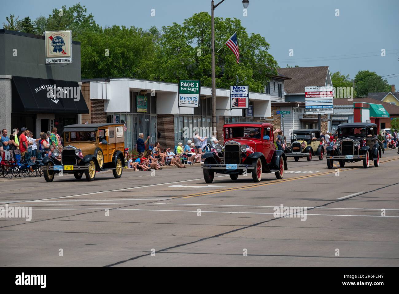 Spectators and participants of the flag day parade in Appleton