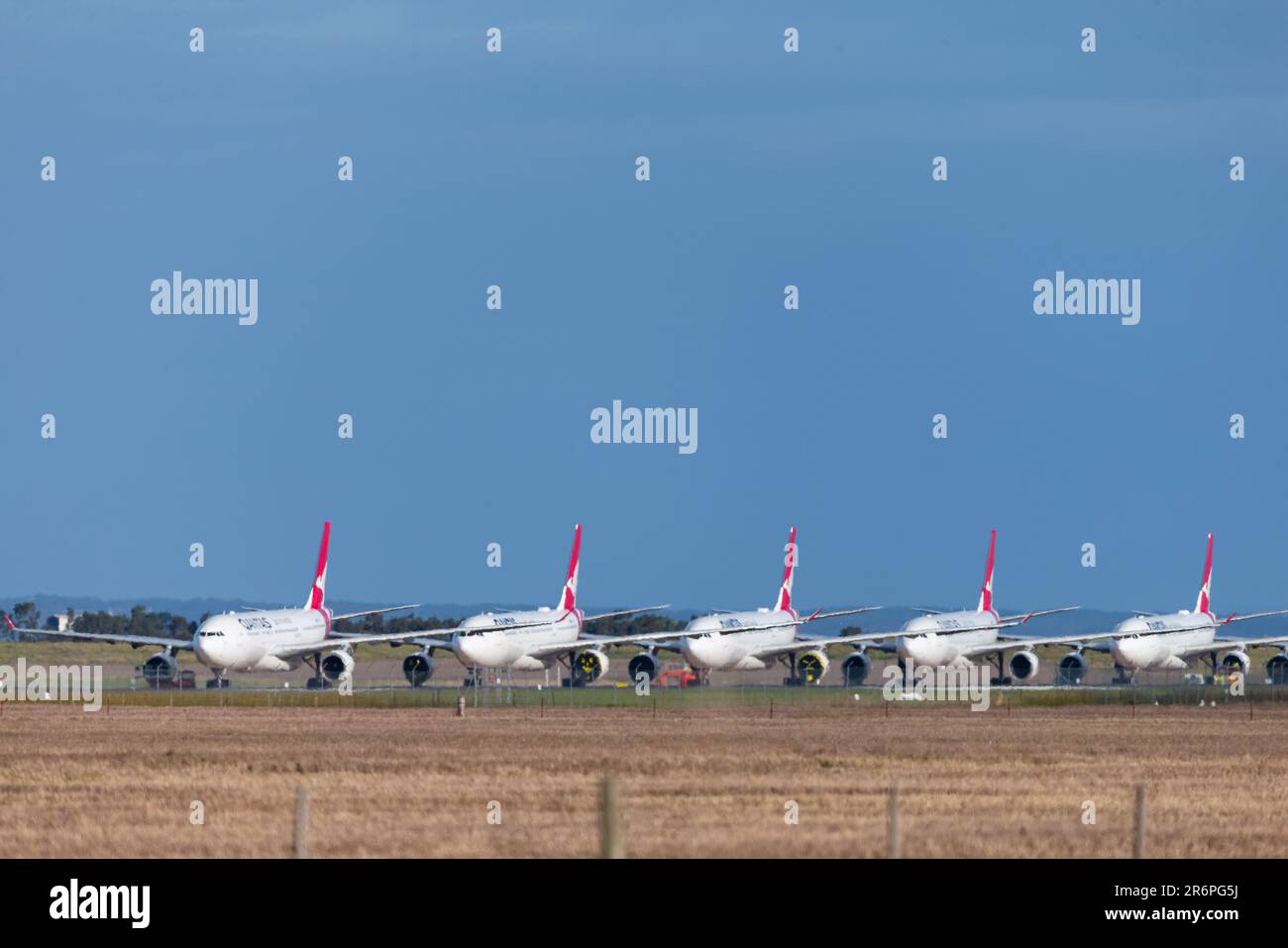 MELBOURNE, AUSTRALIA - APRIL 27: Amid an unprecedented decline in air travel due to COVID 19 Qantas and Jetstar are having to ground their aircraft. Qantas aircraft stowed at Avalon Airport on 27 April, 2020 in Melbourne, Australia. Stock Photo