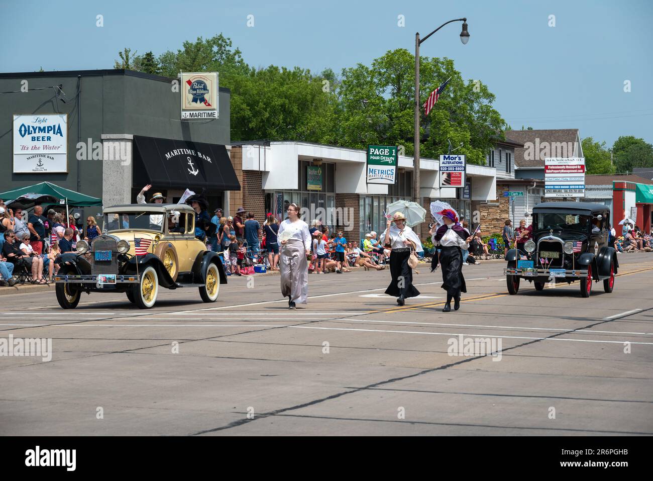 Spectators and participants of the flag day parade in Appleton