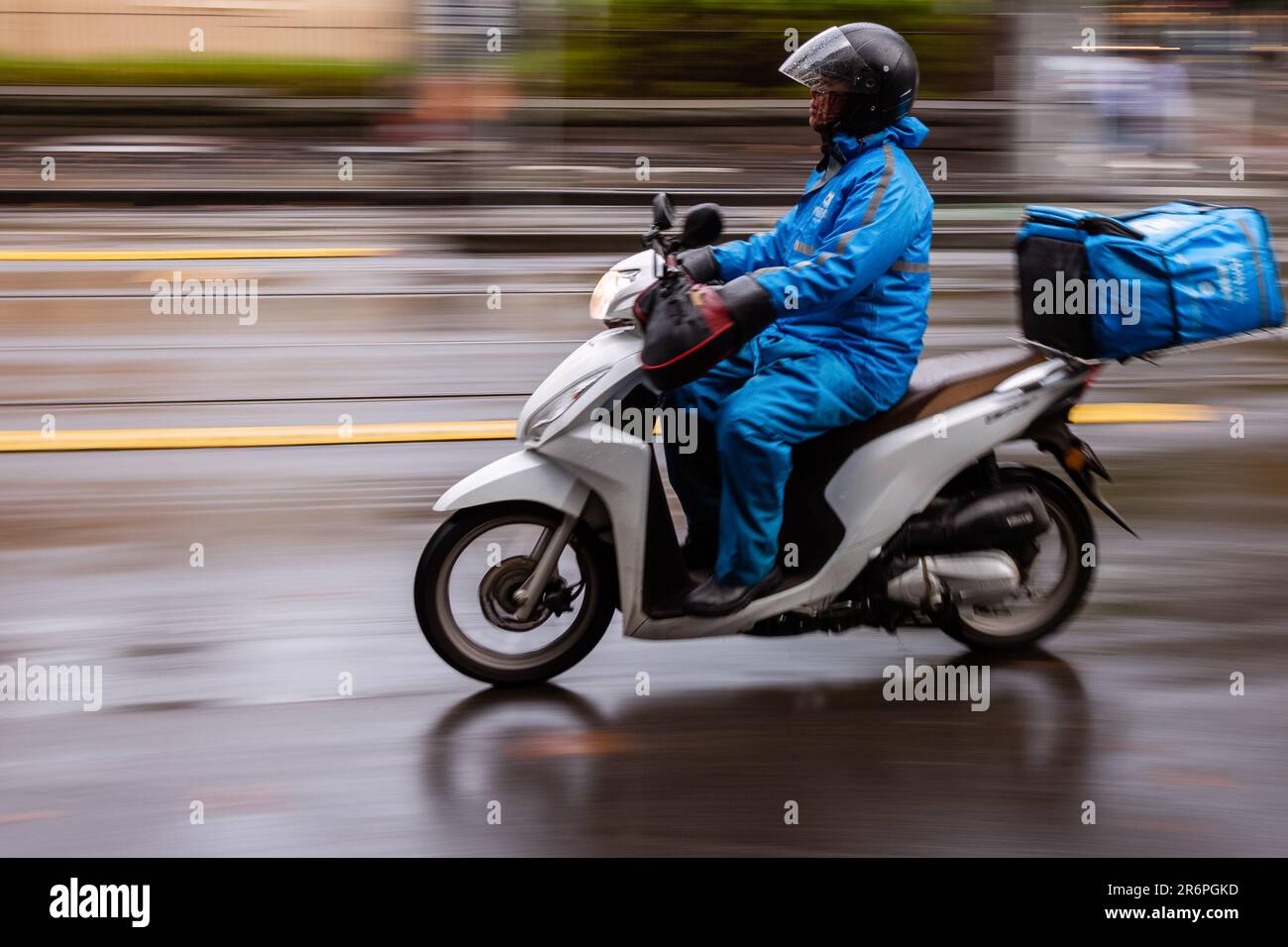 MELBOURNE AUSTRALIA MAY 09 A food delivery person riding a