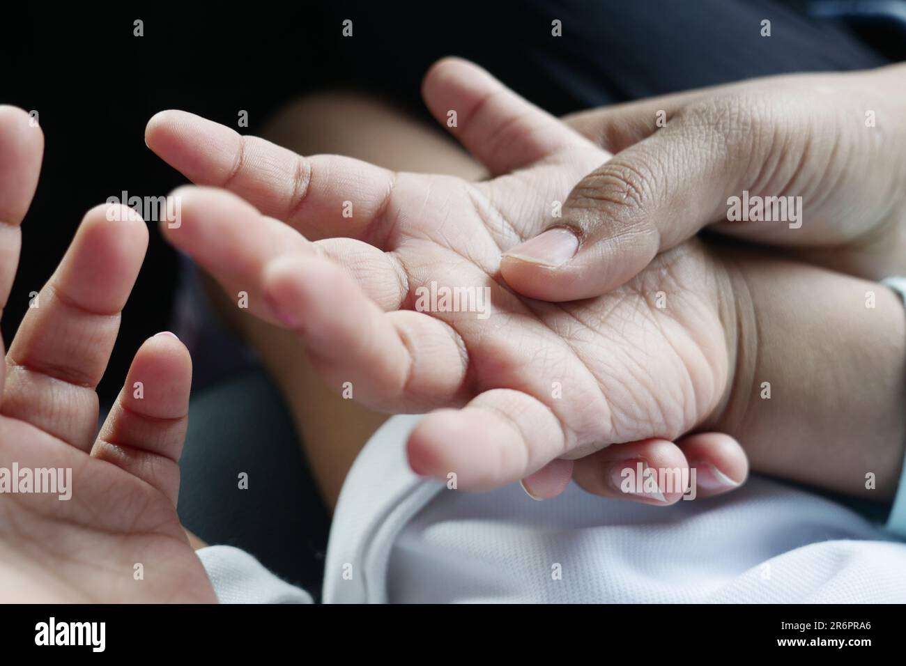 father holding hand of baby child, close up Stock Photo - Alamy