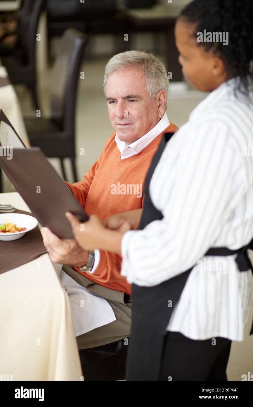 Waitressing Man Waitress, hotel and senior man in a restaurant for breakfast or lunch ...