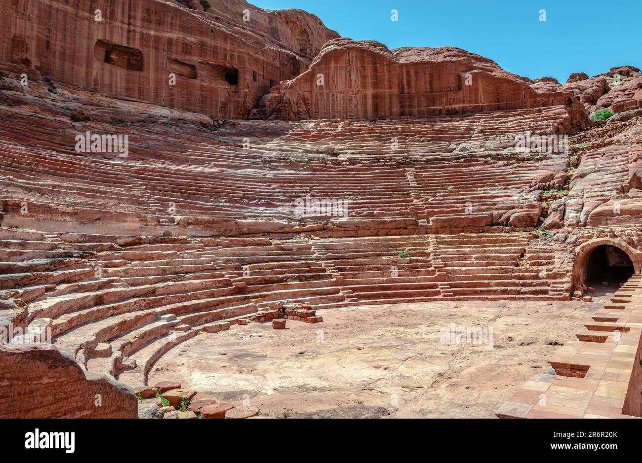 Petra Theater, a first century AD Nabataean theatre. Part of it was carved out of solid rock, while the scaena and exterior wall were constructed Stock Photo