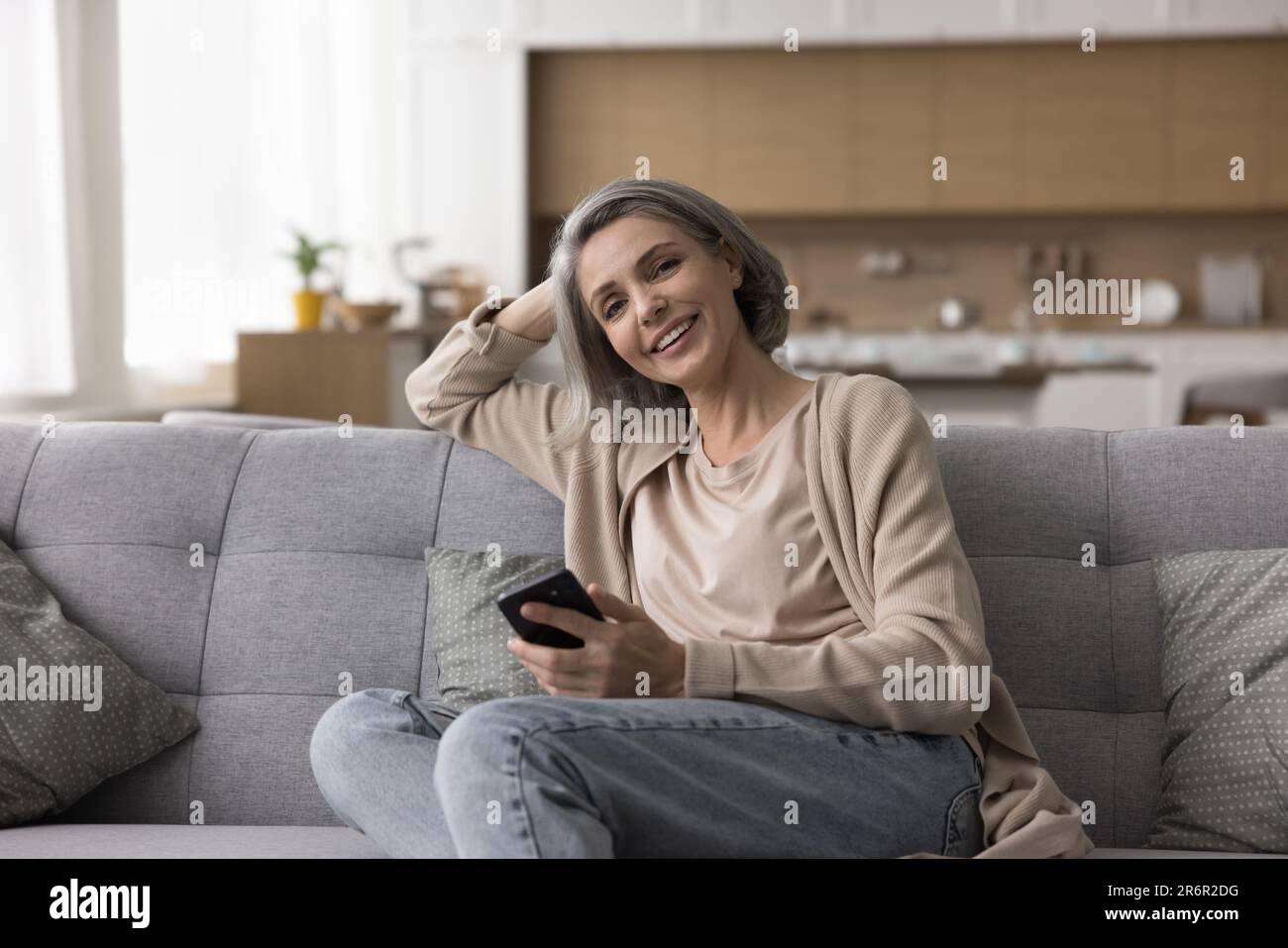Happy naturally grey haired hi-res stock photography and images - Alamy