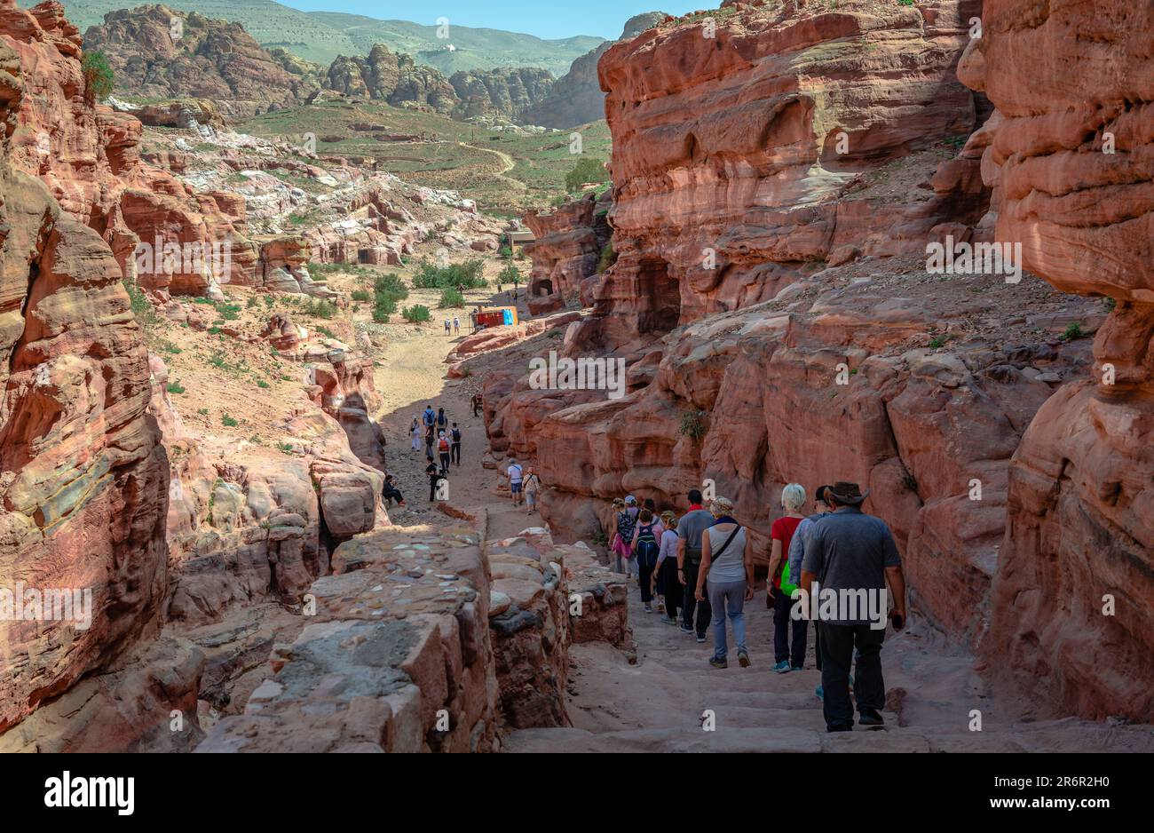 Petra, Jordan - April 16 2023: Hikers on the main trail that leads from the Basin to the Monastery (Ad Deir) Stock Photo