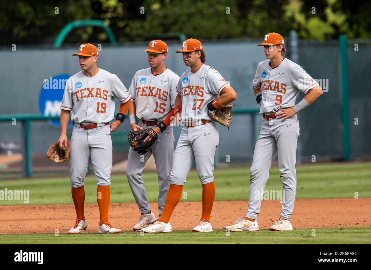Palo Alto Calif, USA. 10th June, 2023. Texas catcher/third base Peyton Powell (15), Texas infielder Jack O'Dowd (27)and Texas infielder Jared Thomas (9)looks on as the new pitcher warm up during the NCAA Super Regional Baseball game between Texas Longhorns and the Stanford Cardinal. Texas beat Stanford 7-5 at Klein Field at Sunken Diamond in Palo Alto Calif. Thurman James/CSM/Alamy Live News Stock Photo