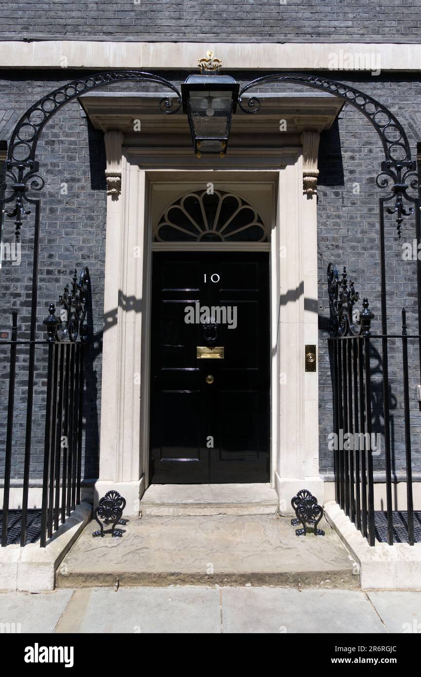 A Row of Brick Buildings with Black Doors on a Street in London Stock Image  - Image of architecture, english: 189002149