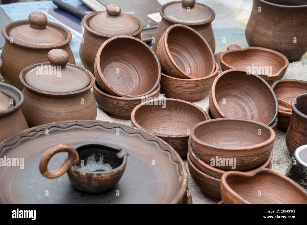 Different examples of tradtional ukrainian clay pottery pots, jars