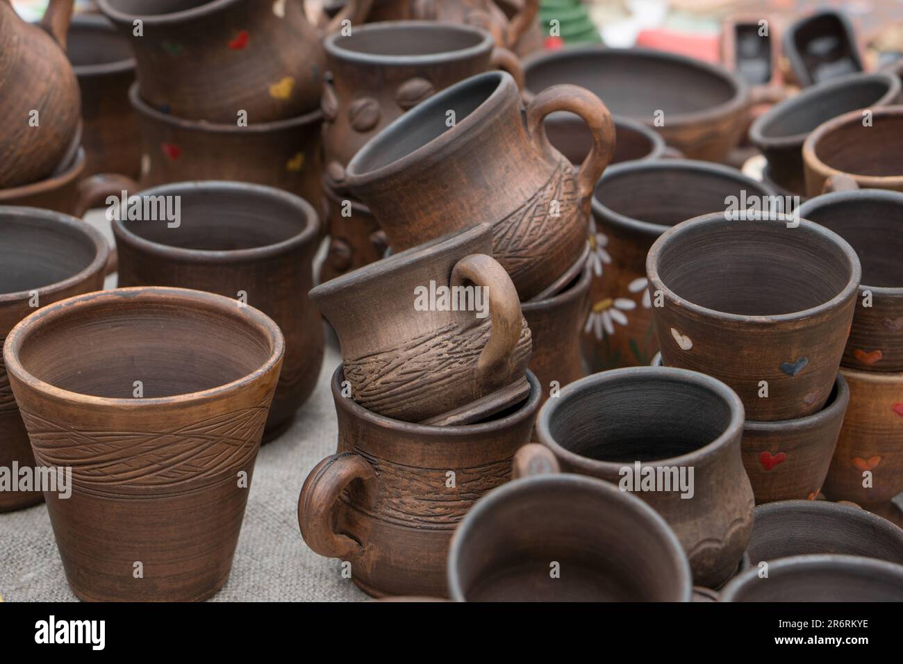 Different examples of tradtional ukrainian clay pottery pots, jars