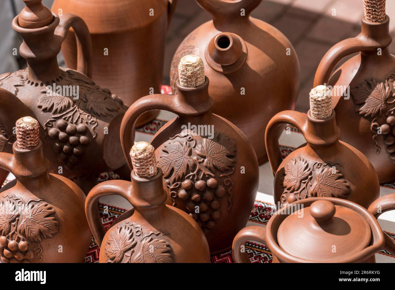 Different examples of tradtional ukrainian clay pottery pots, jars