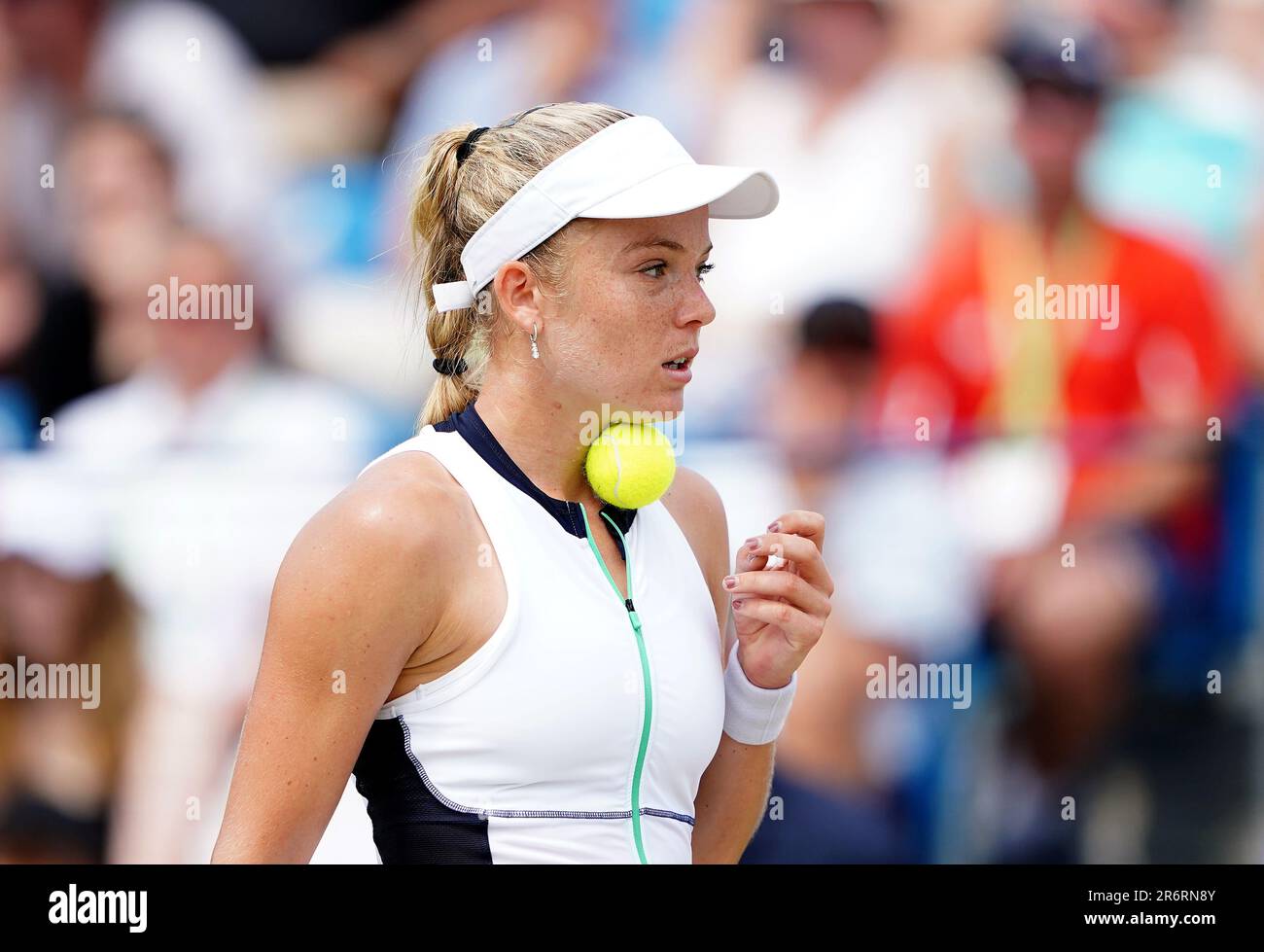 Katie Swan traps a ball under her chin during her final against Yanina ...