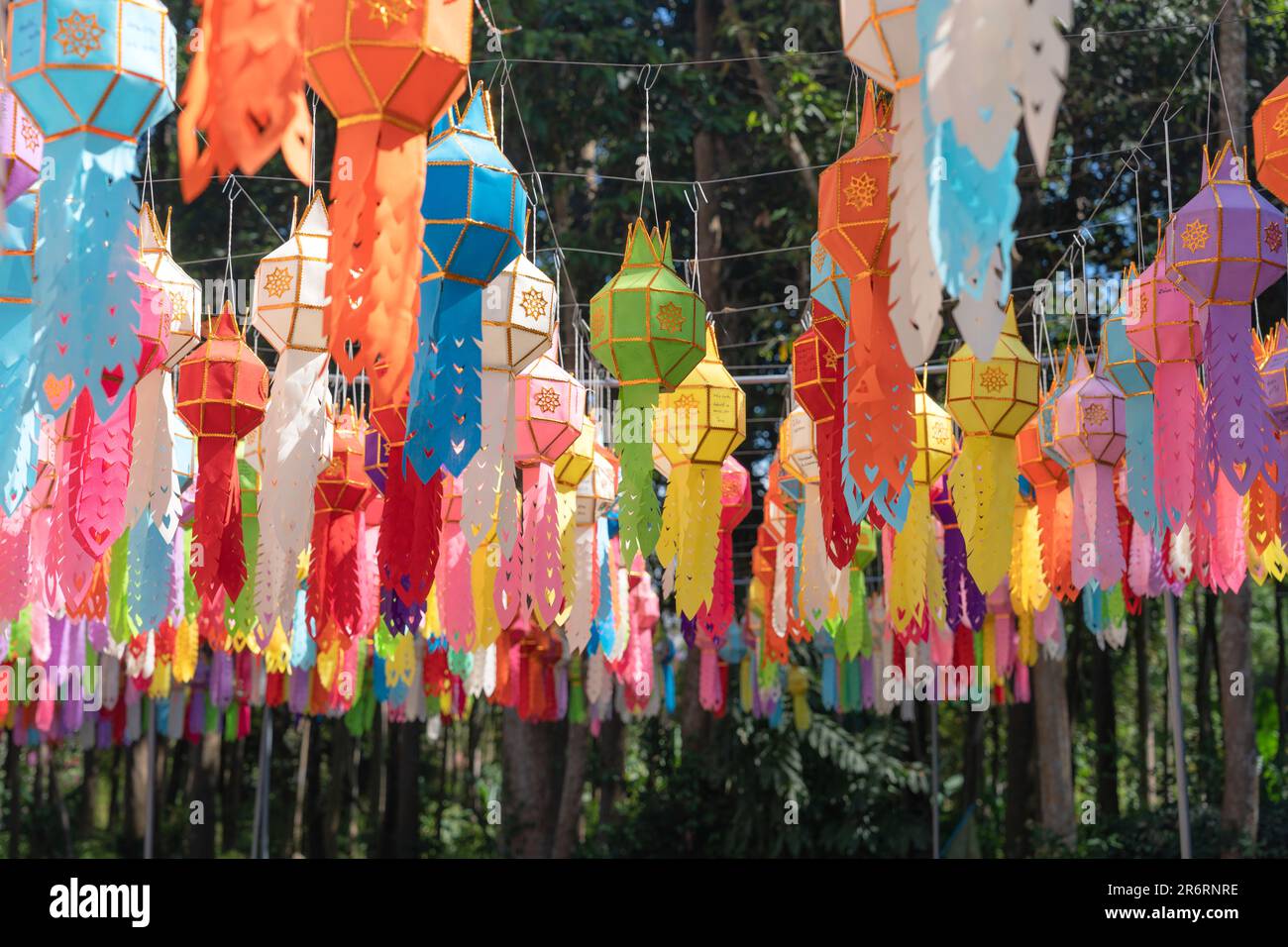 Traditional of multicolor paper lantern or Yi Peng Lanna hanging decorate in buddhist temple at Northern of Thailand Stock Photo