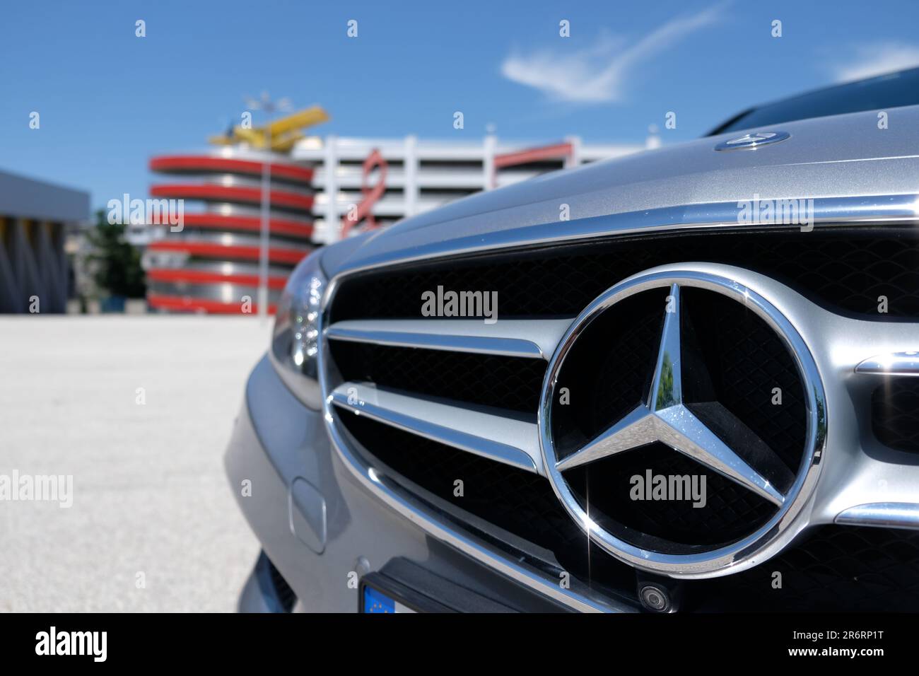 Chrome logo on Mercedes E class Stock Photo