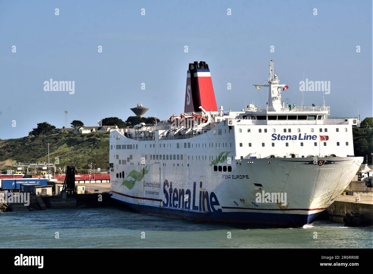 Rosslare Harbour pictured arriving on Irish ferries Blue Star 1, STENA EUROPE and SEATRUCK PANORAMA are  moored, fishing trawlers berthed quayside Stock Photo