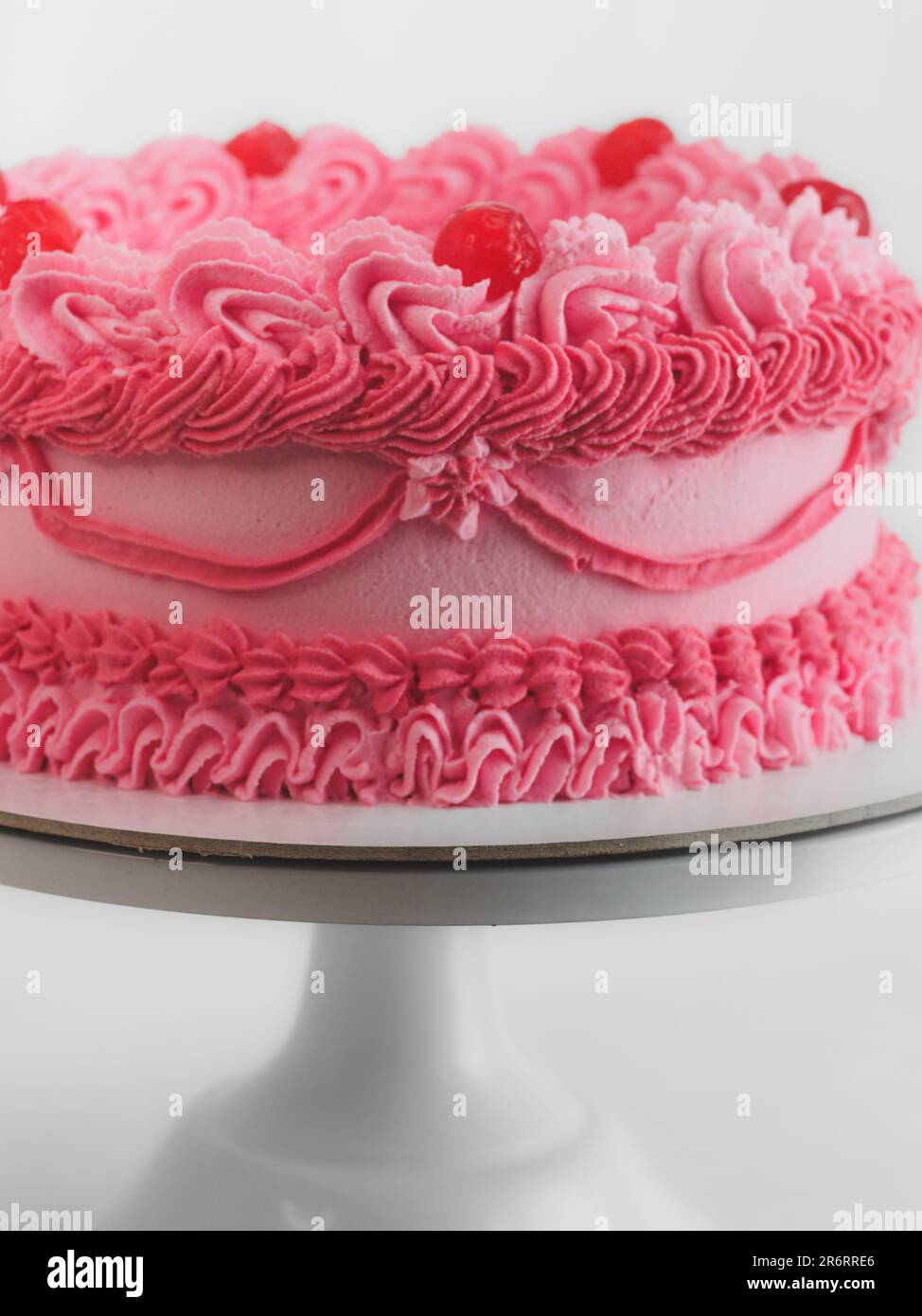 pink sweet frosted icing cup cake with italian english text sign ...