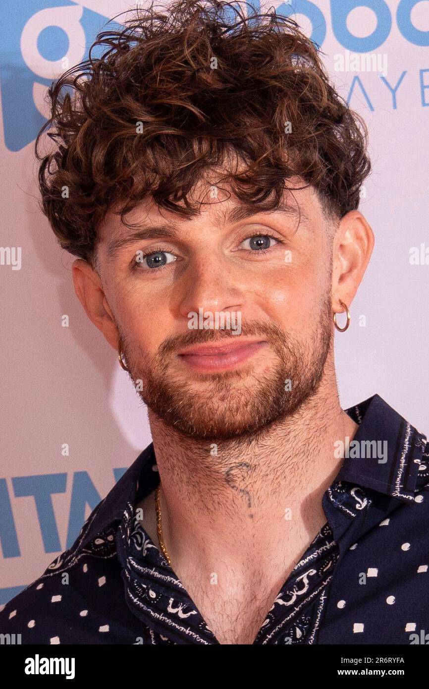 Tom Grennan poses for photographers upon arrival at the Capital FM