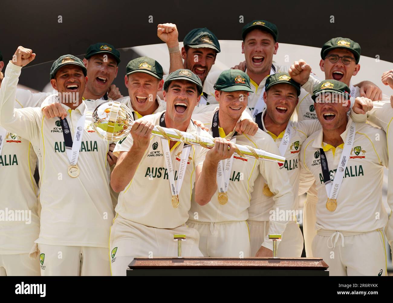 Australia’s Pat Cummins and team mates celebrate with their trophy following victory over India during day five of the ICC World Test Championship Final match at The Oval, London. Picture date: Sunday June 11, 2023. Stock Photo