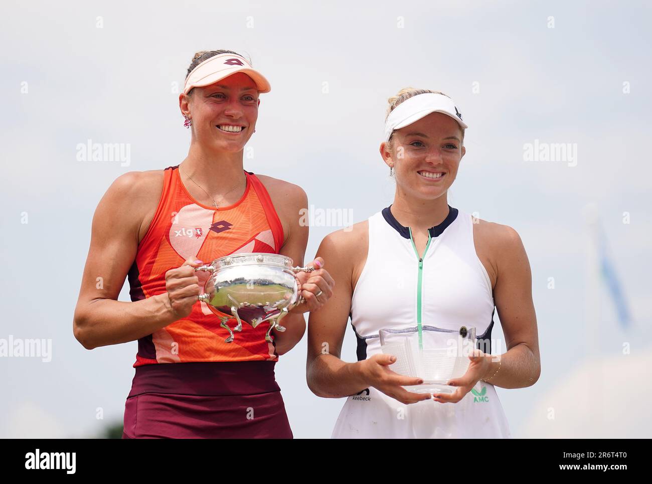 Winner Yanina Wickmayer (left) and runner up Katie Swan collect their ...