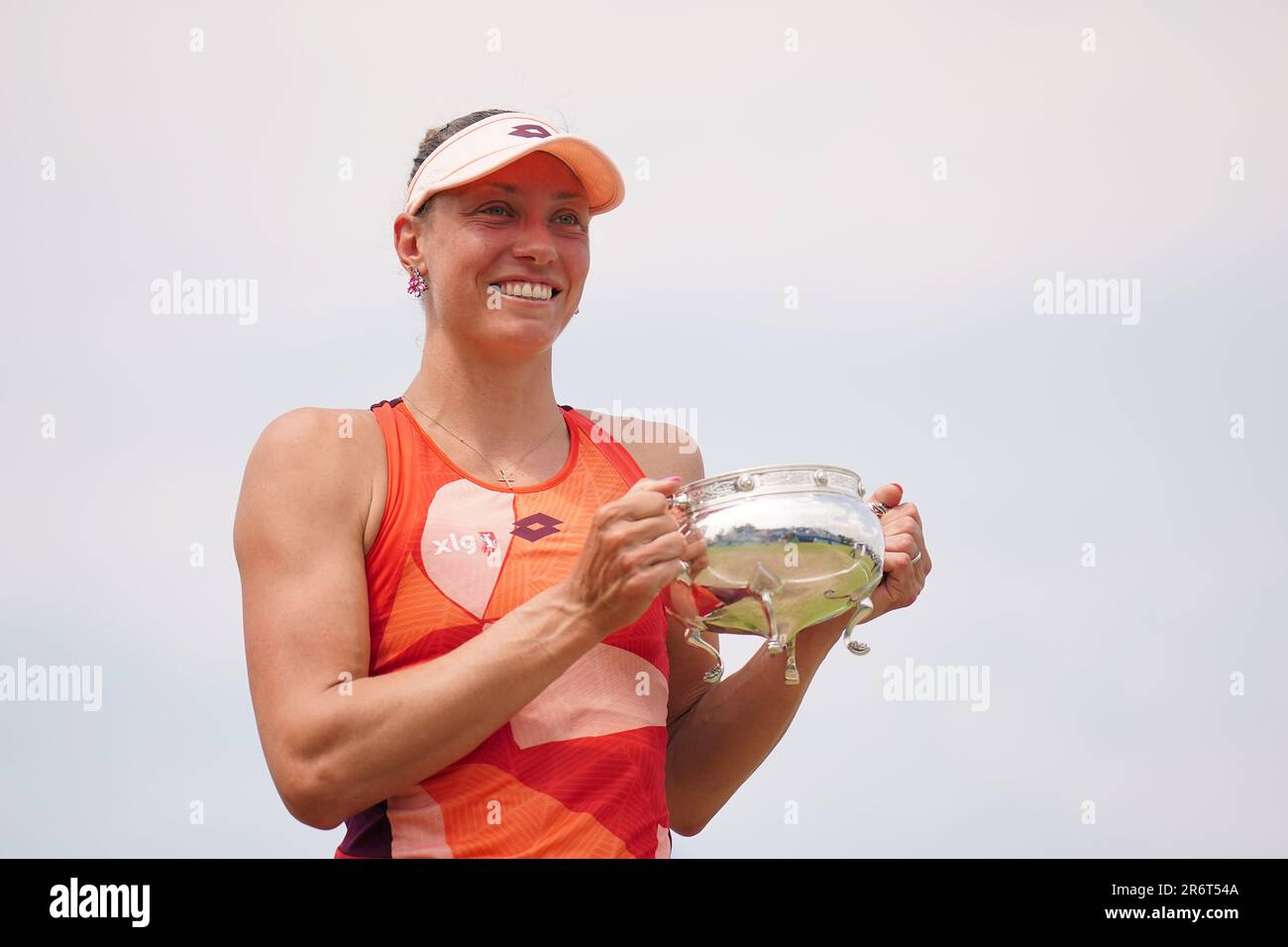 Winner Yanina Wickmayer collects her trophy after winning the final ...