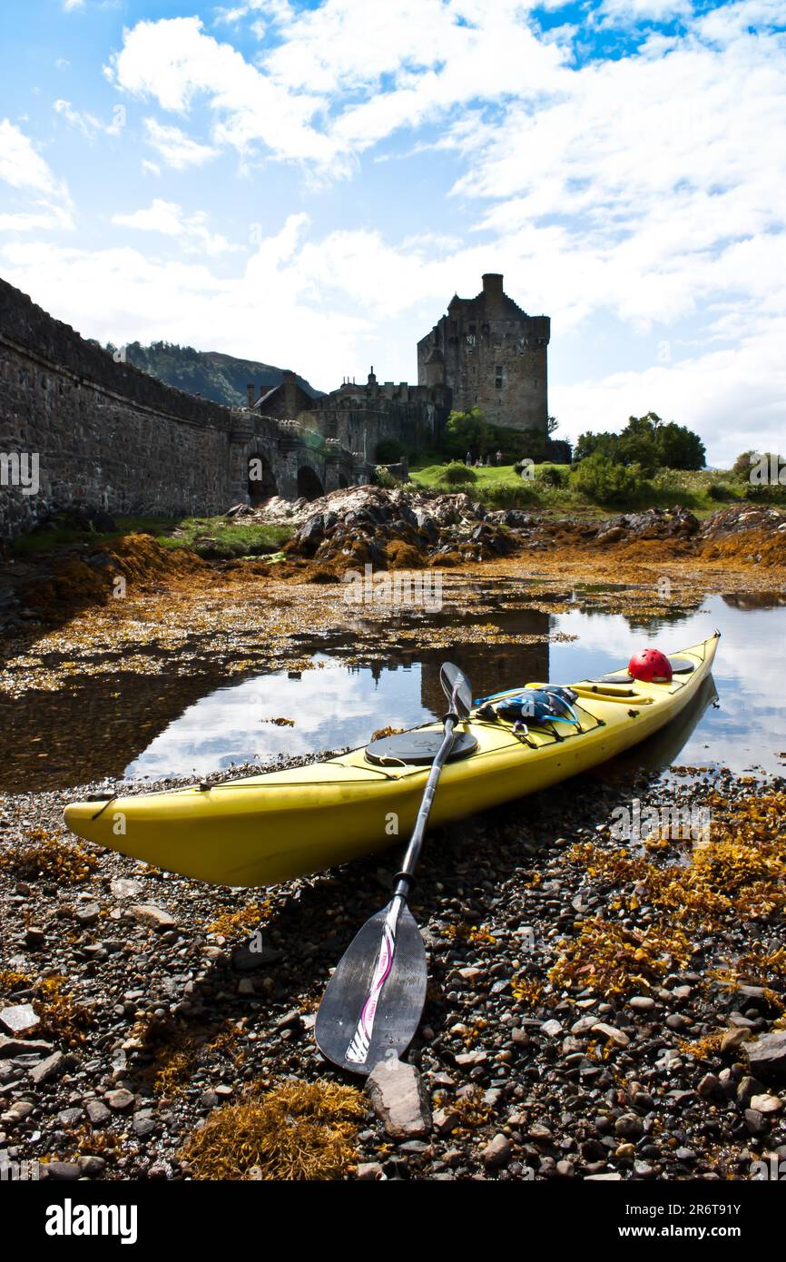 Kayak in front of Eilean Donan Castle, Scotland, United Kingdom Stock Photo