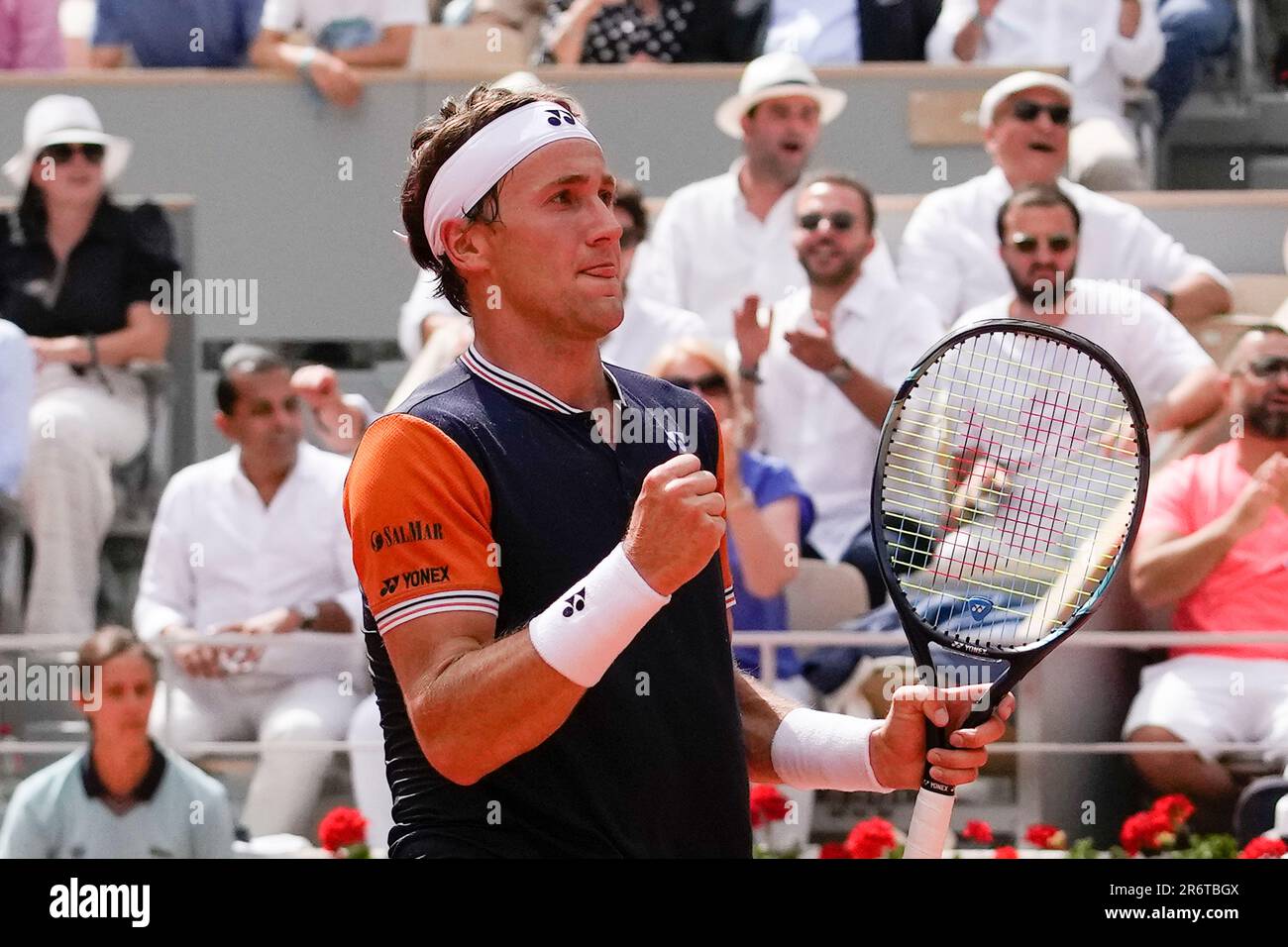 Norway's Casper Ruud clenches his fist after scoring a point against  Serbia's Novak Djokovic during the men's singles final match of the French  Open tennis tournament at the Roland Garros stadium in