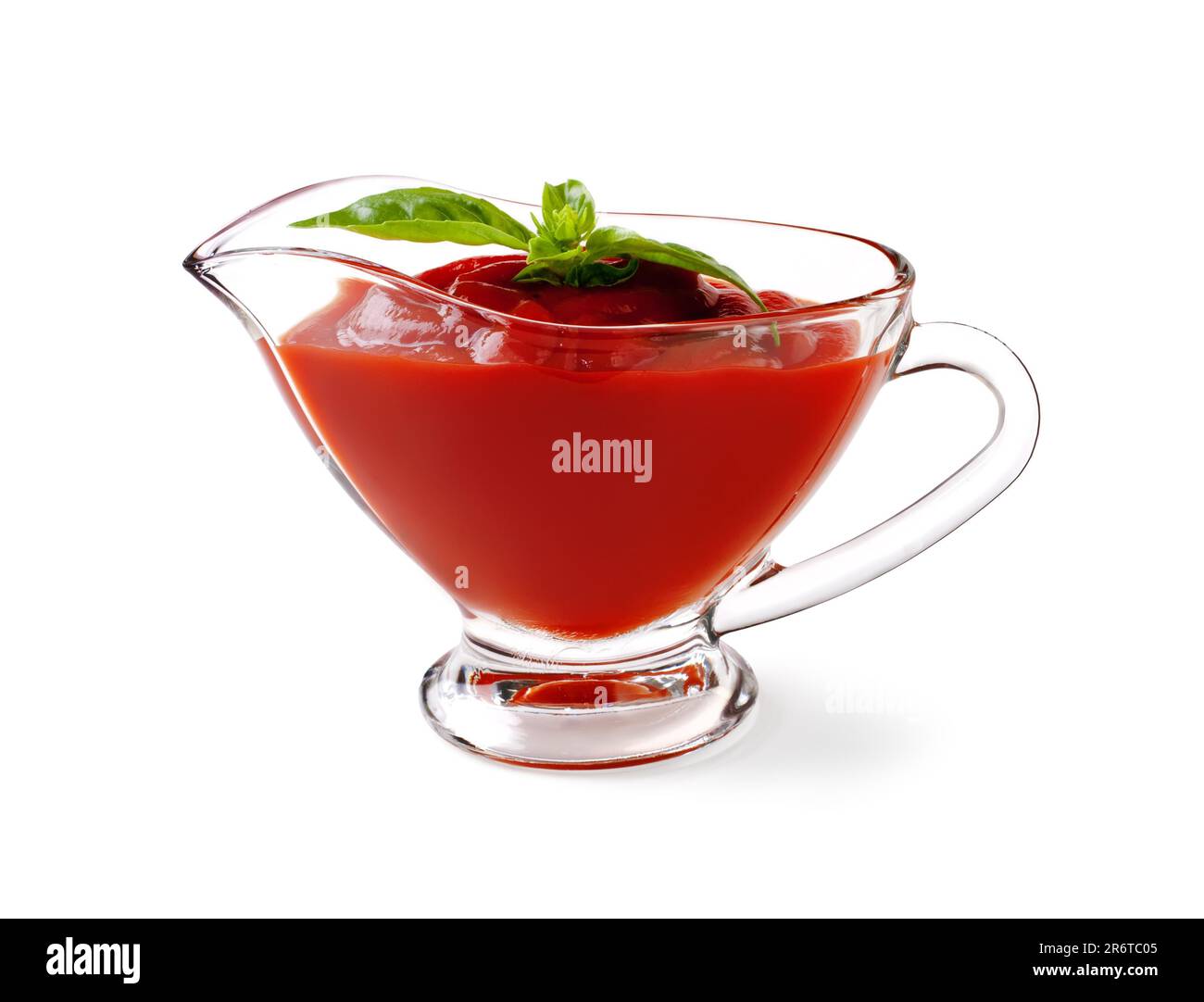 tomato sauce with basil leaf on a white backgroundand with soft shadow ...