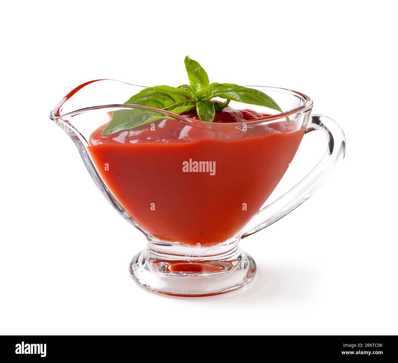 tomato sauce with basil leaf on a white backgroundand with soft shadow ...