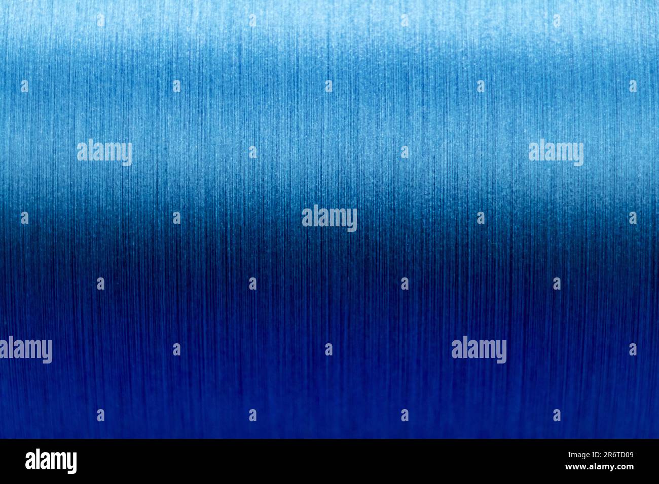 Closed up of blue color of thread textured background (Focus at center ...