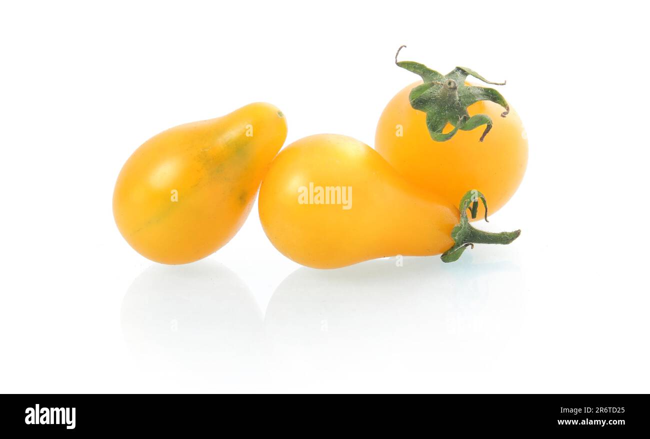 Yellow pear-shaped tomato vegetables isolated on white background Stock Photo