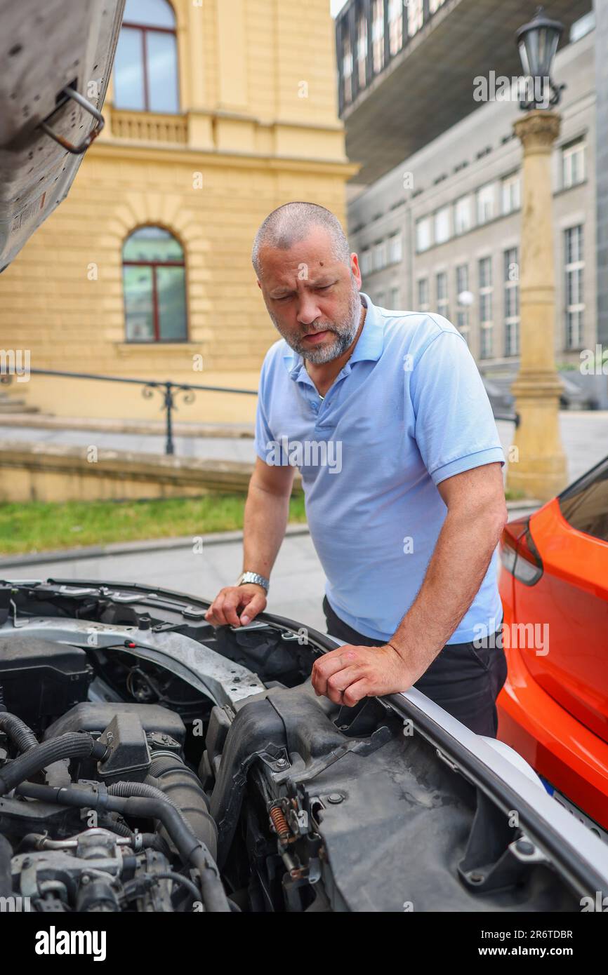 Oil change instructions hi-res stock photography and images - Alamy